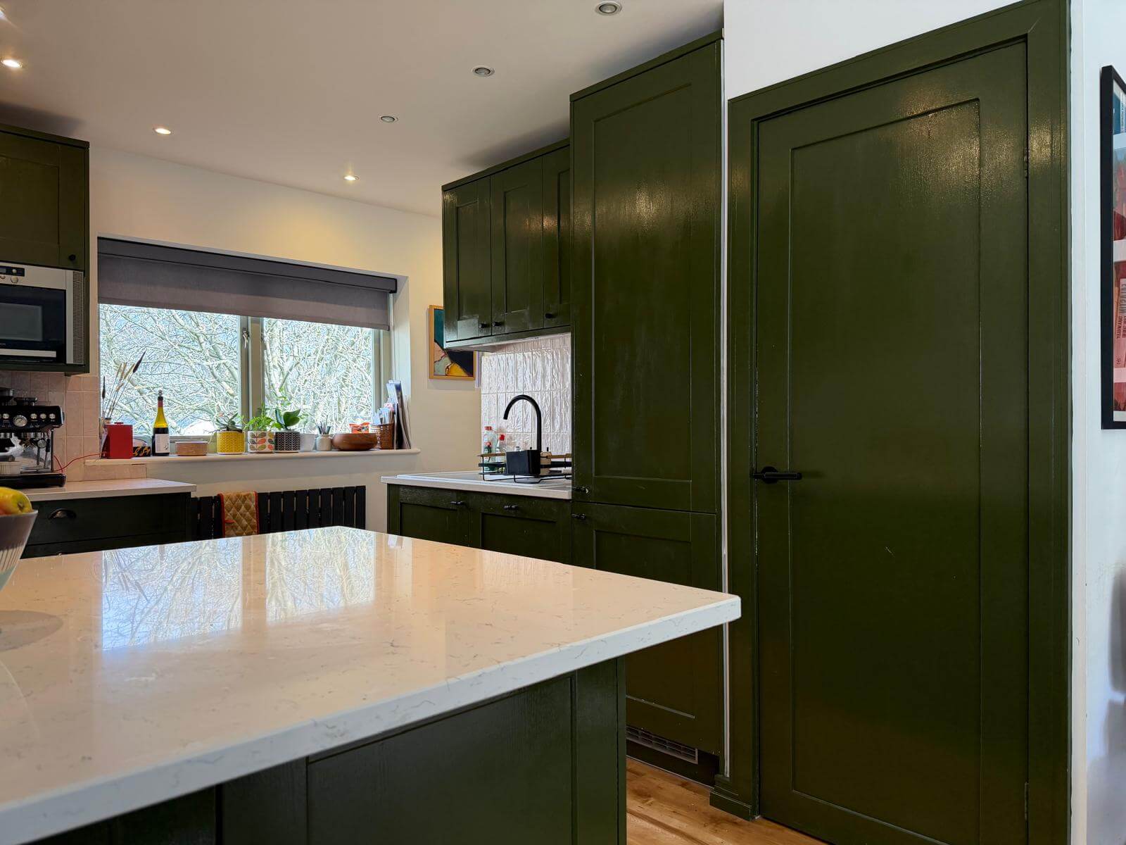 Before - Dark green cabinets