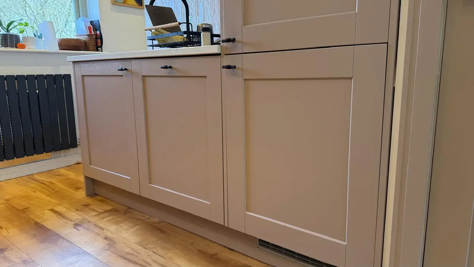 After - Taupe shaker style cabinets