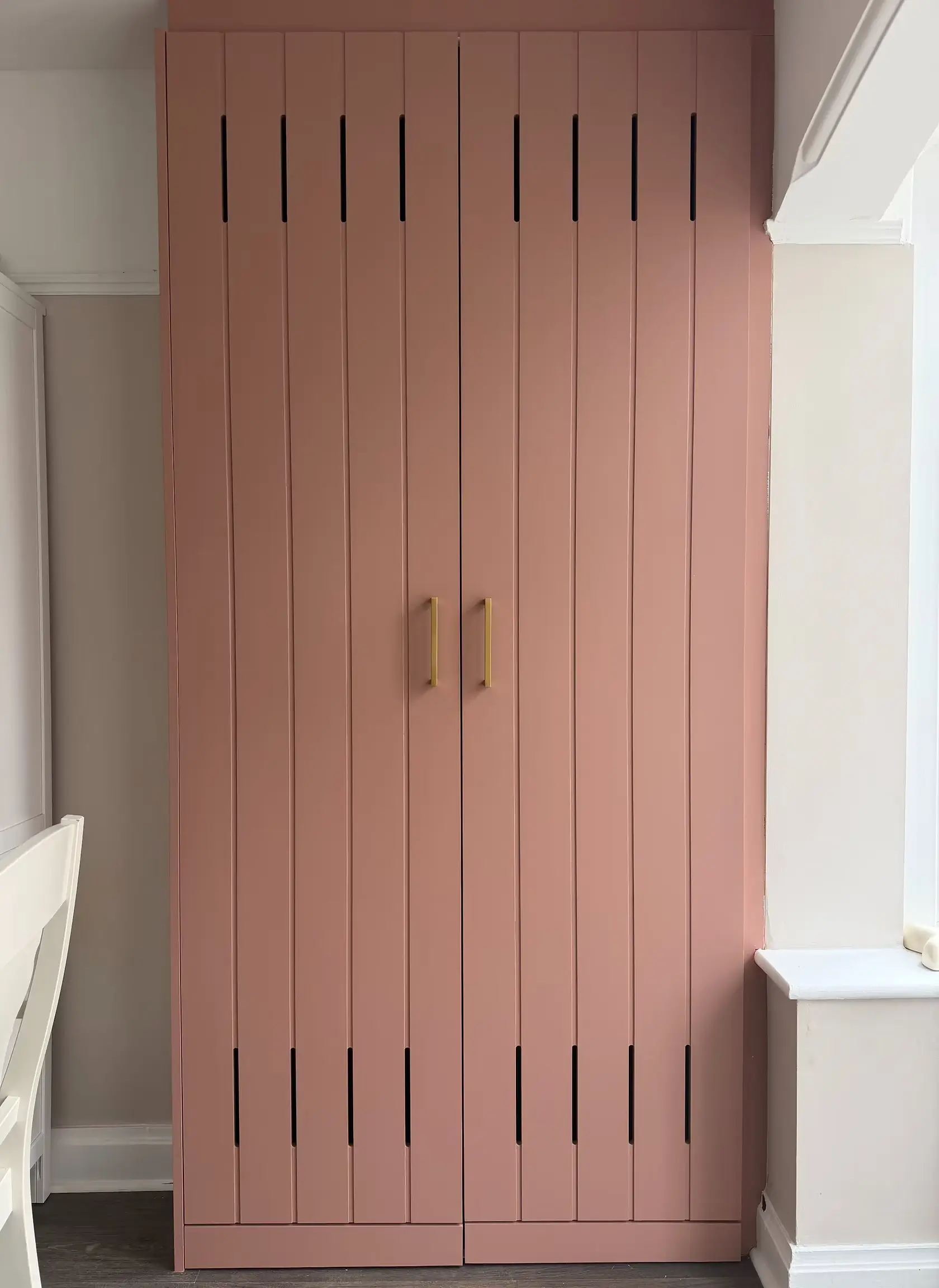Beautifully resprayed pink fitted wardrobes
